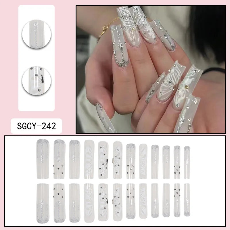 24 piezas de uñas postizas ultra largas con forma de ataúd, con diseño francés, degradado y flores, mariposa 3D, puntos, diamantes y acabado brillante.