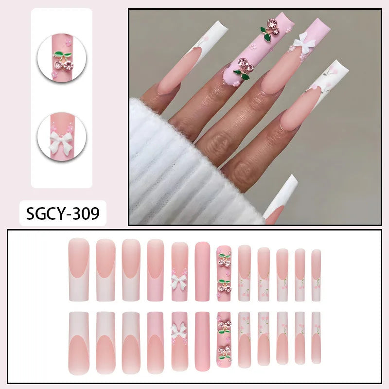 24 piezas de uñas postizas ultra largas con forma de ataúd, con diseño francés, degradado y flores, mariposa 3D, puntos, diamantes y acabado brillante.