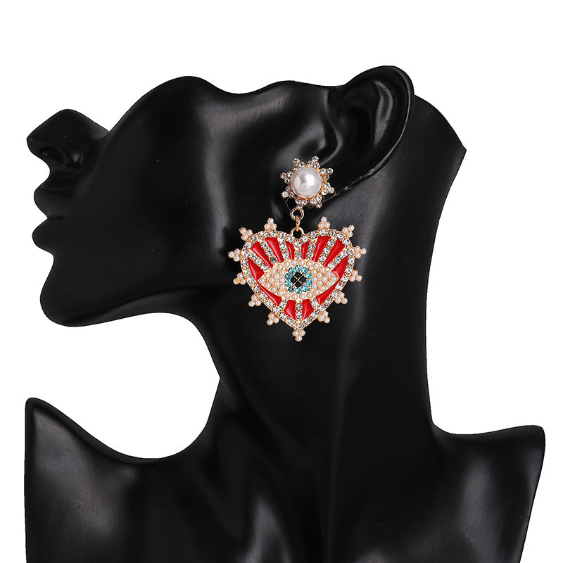 New Angel Eye Earrings Net Red Earrings Female Korean Trendy French Devil Stud Earrings